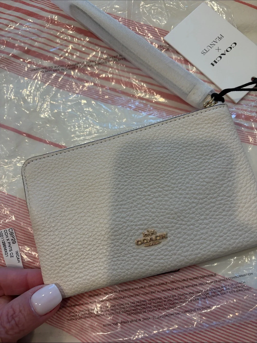 Coach Wristlet Clutch in Cream with Black Accent
